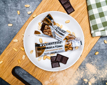 Lade das Bild in den Galerie-Viewer, #WEGAIN Dark Chocolate & Peanut Low Sugar Nut Bar 40g - Tray a 12 Riegel